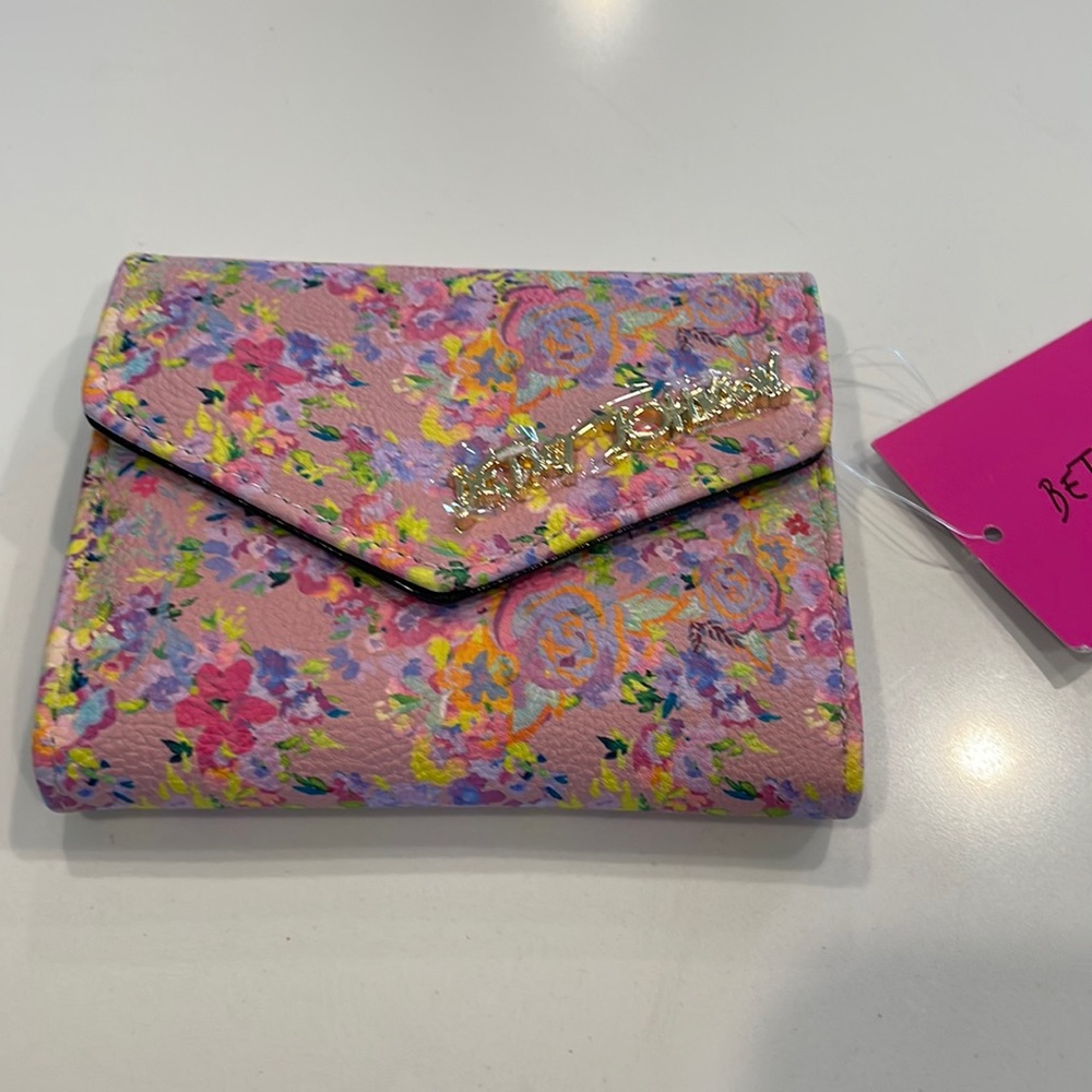 Betsy Johnson wallet. Beautiful floral color. New with tags.